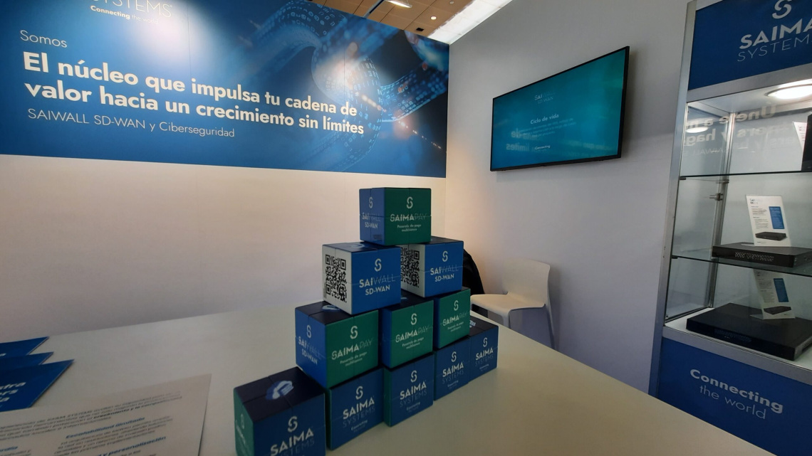 Stand de SAIMA SYSTEMS en ASLAN 2025 presentando SAIWALL Secure SD-WAN y ciberseguridad.